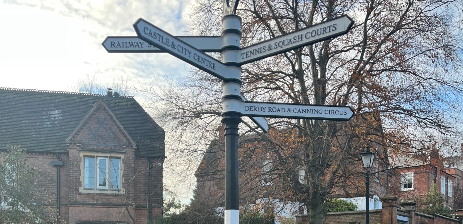 Photo of the directional signs on the roundabout on Lenton Road